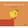 Une poule sur un mur