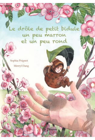 Le drôle de petit bidule un peu marron et un peu rond